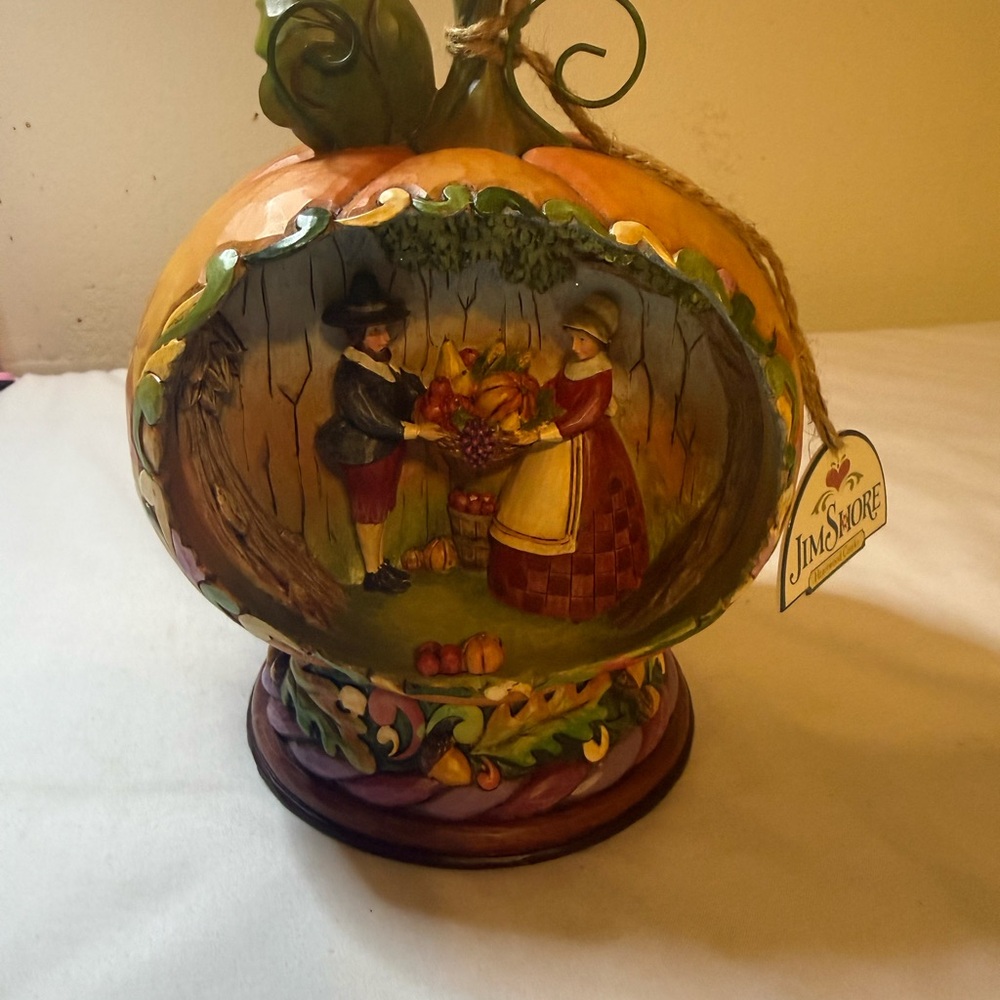 Jim Shore hand-painted pumpkin figurine in orange, green, purple
